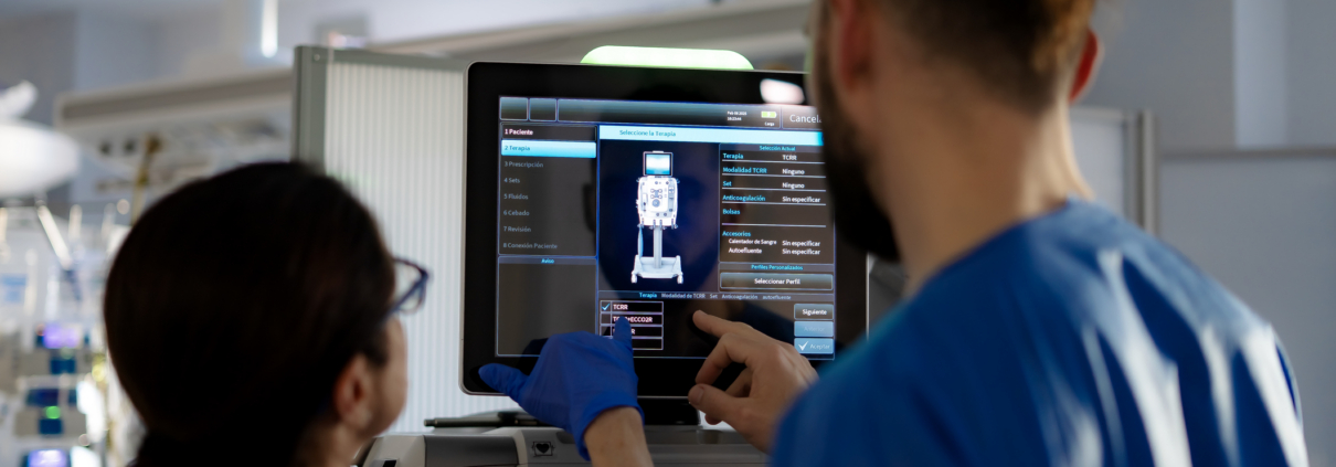 icu nurses operating a dialysis machine in intensive care