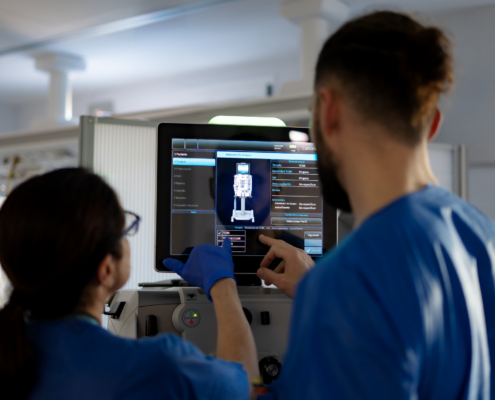 icu nurses operating a dialysis machine in intensive care