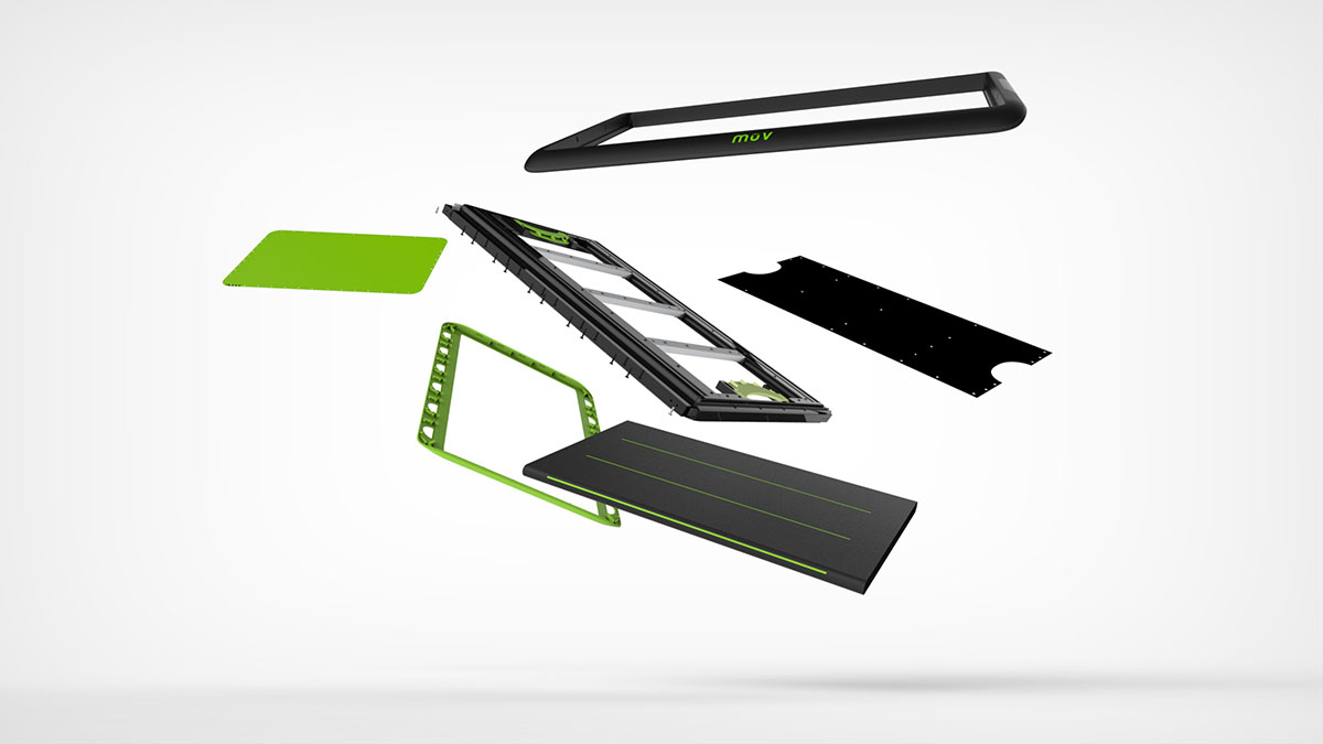An exploded view of a rectangular electronic device with black and green components, including frames, panels, and circuit-like parts, suspended in mid-air against a white background.