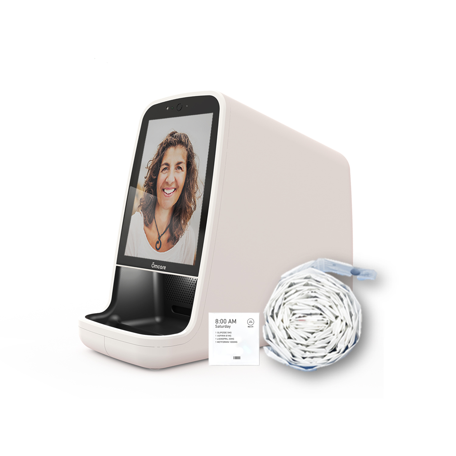 A white medical device with a screen displaying a smiling woman, a coil of white tubing, and a small instruction card placed beside the device, all set against a white background.